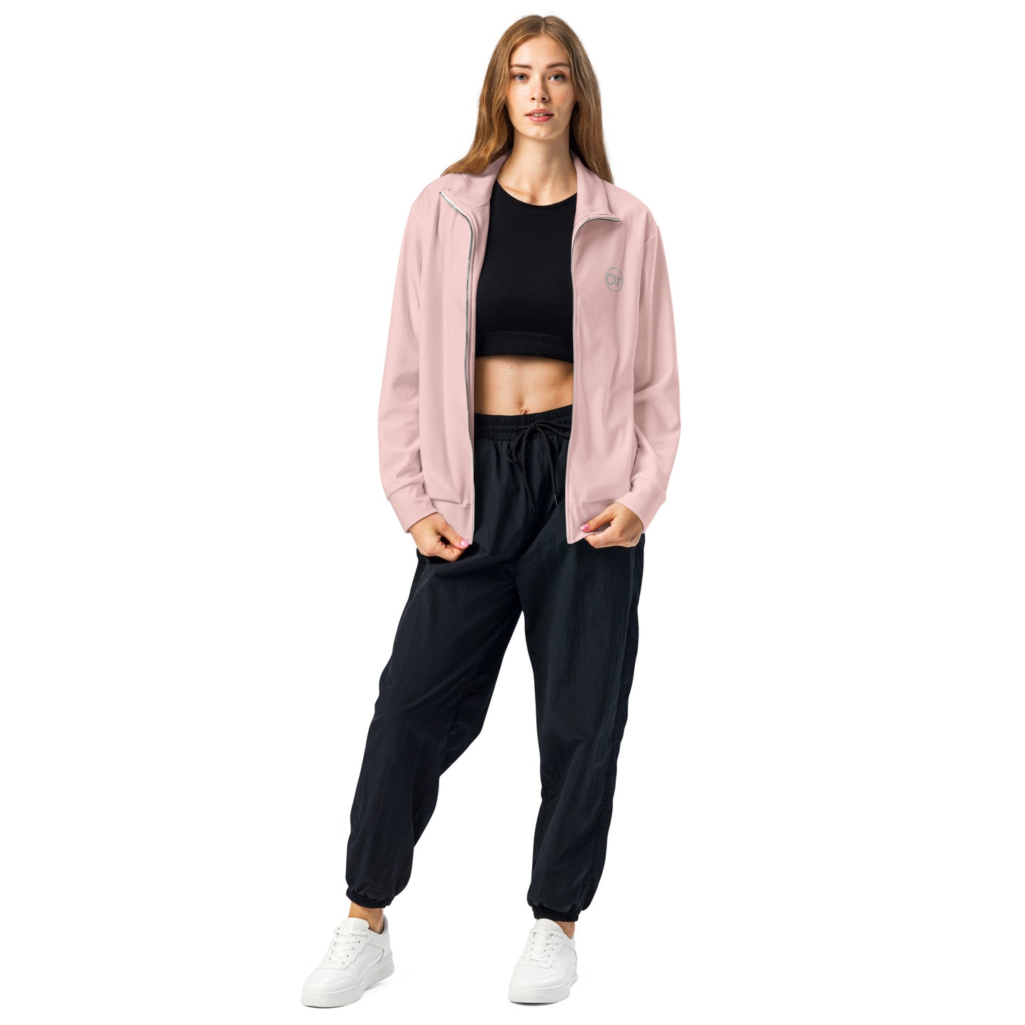 Light pink unisex Ctrl Padel elite track jacket shown from the front