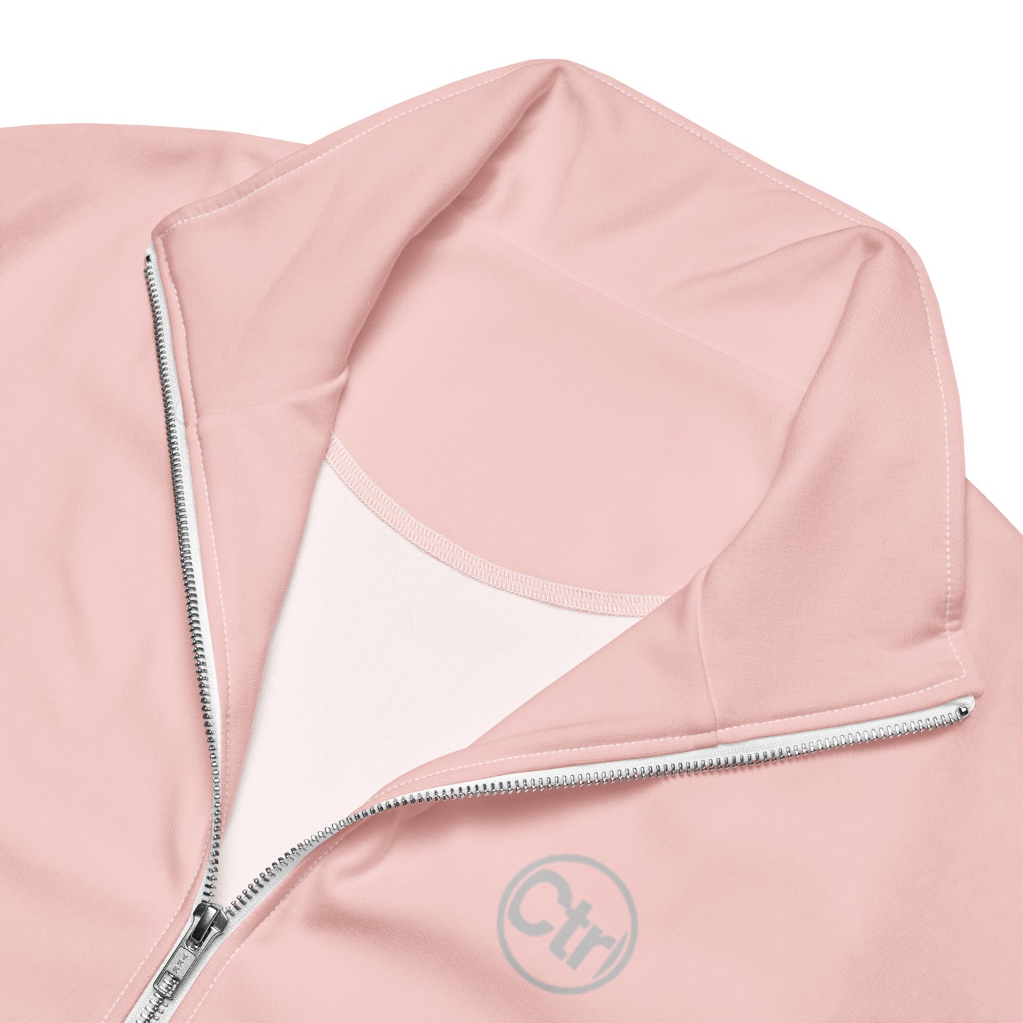 Light pink unisex Ctrl Padel elite track jacket showing zipper and logo 